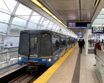 Another older series Mark Set slows for Main Street-Science World Station-bound for Waterfront